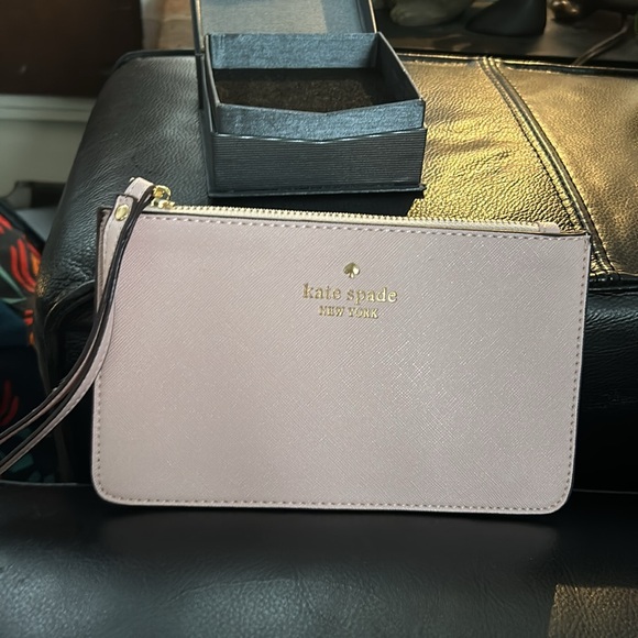 kate spade Handbags - Kate Spade Pinkish Wristlet Bag